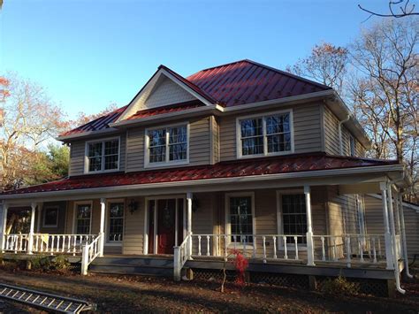 red house with green metal roof|colonial red metal roofing.